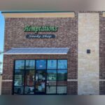 Car Crashes Into Carrollton Smoke Shop, Driver Trapped Inside
